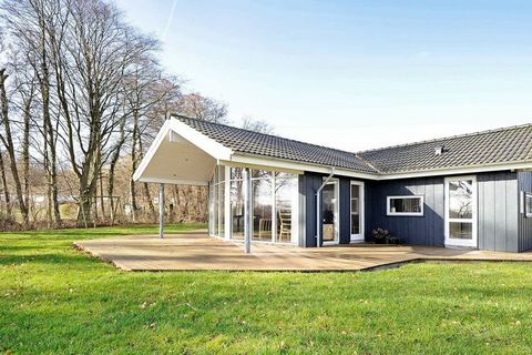 Modern furnished holiday cottage from 2006 with bright furniture. The kitchen has a dish washer whereas washing machine, dryer and micro wave is in the hall way. The bathroom has a 2 person whirlpool and a 5 person sauna. The living room has a wood-b...