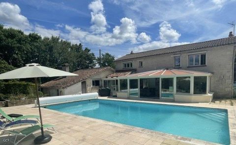 Superb detached 4 bedroomed property with a pool, gite/studio and outbuildings, situated in the countryside but less than 10 minutes from main commerce and schools. It has an impressive archway entrance and long driveway leading up to the property. T...