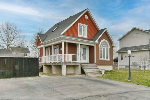 This unique home with an original design is located in a quiet neighborhood on a street corner. It has 2 bedrooms with a possibility of creating 2 more, 2 bathrooms, high ceiling. The main floor has a closed dining room which could be converted into ...