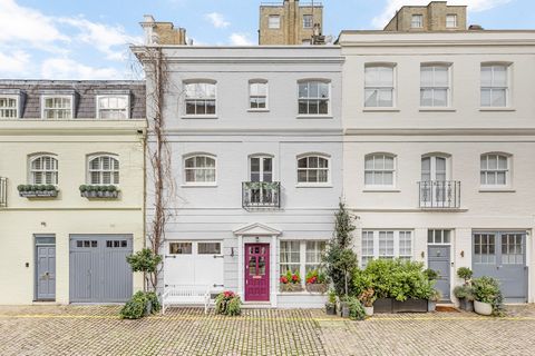 Tucked on a beautiful cobbled street right in the heart of South Kensington, this wonderful five-bedroom house unfolds over four floors, crowned by a roof terrace and with extra storage under the basement. Recently redesigned by the current owner, th...