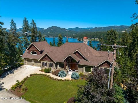 Luxurious Custom-Built Home with Lake Access and Stunning Views of Hayden Lake. Rare opportunity! Exquisite 5,900 sq ft meticulously crafted custom home offering stunning Hayden lake views, lake access (dock) as well as an additional building site av...