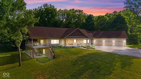 Welcome to a gorgeous retreat that will not disappoint-an absolute dream for nature enthusiasts. This custom-built home features an oversized, three-car attached heated garage with ample storage. Guests are greeted by impressive entry doors leading t...