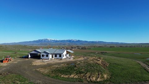 Gorgeous residence situated on 40 acres, featuring views of both Cuddy and Council Mountain. This ranch includes a home that spans 1,548 square feet, constructed in 2021. The pasture is already ideally configured for livestock. Enjoy the landscape fr...