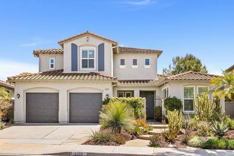 Pristinely maintained, this home sets the new standard for quality living. Lush landscaping greets you at the curb, then step in through the gated patio entry to your private haven of elegance and comfort. Revel in the richness of the Acacia wood flo...