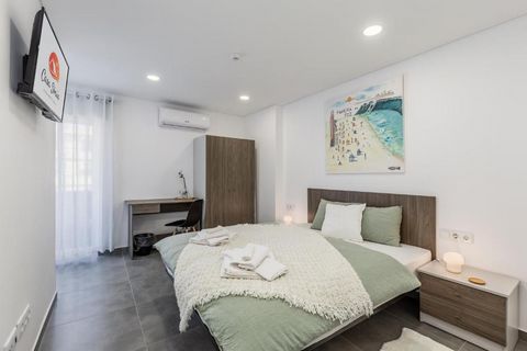 This double room has air conditioning, a closet and a private bathroom with a shower and a hairdryer. The double room features tiled floors, heating, a flat-screen TV and a view of a quiet street. This unit provides 1 bed. ---------- Casa Sónia offer...
