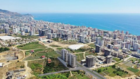 Nueva propiedad inmobiliaria con vistas al mar cerca de la playa en Alanya Mahmutlar Las nuevas propiedades inmobiliarias se encuentran en Mahmutlar, una de las zonas preferidas tanto para vacaciones como para inversiones con sus hoteles, restaurante...