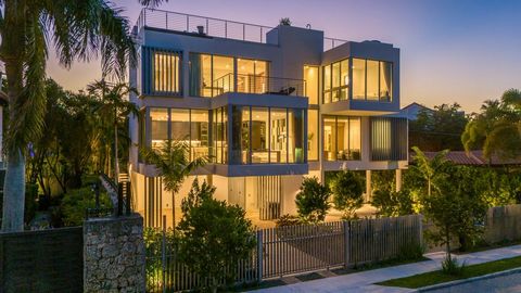 Introducing this Magnificent tri-level, New Construction Residence, equipped with a Private Elevator, boasting 6,625SF of Entertaining and Living Space, nestled on the cul-de-sac of Crystal View Ct in Coconut Grove. Looks like a Mansion by Day and a ...