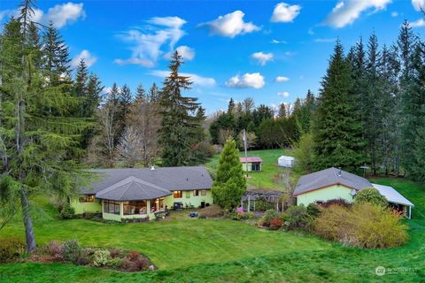 A Remarkable Opportunity Awaits! Sale includes 3 parcels totaling nearly 13.5 acres w/ so much possibility! A meticulously crafted home surrounded by private acreage & promising potential is one you do not want to miss! First time on the market it of...