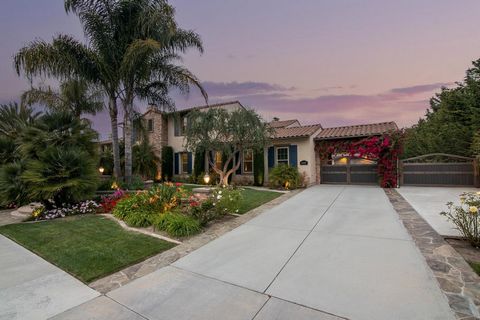 Experience a luxurious oasis with mountain views in Stonebridge Estates - boasting 5 beds, 5.5 baths on a .53-acre lot this home offers a yard with mature landscape, 14 fruit trees + resort style heated pool and spa, built in outdoor barbeque, fire p...