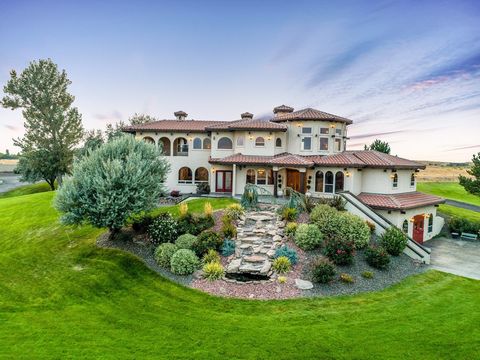 The Goodson Road Estate features a 5,528 SqFt Spanish-style estate on 10+ acres in Caldwell, Idaho. The property features a well appointed home, two casitas, a motocross track, and manicured landscaping including a chlorinated swimming pond with wate...