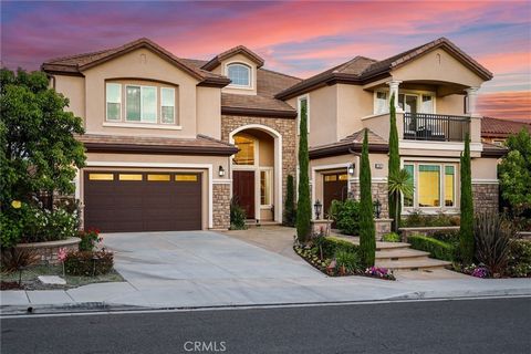 Welcome to this stunning residence in the prestigious Estates at Yorba Linda, a luxurious Toll Brothers home designed with exquisite attention to detail. Built in 2015, this Residence Five | Castelli model offers an impressive 5 bedrooms, 6.5 bathroo...