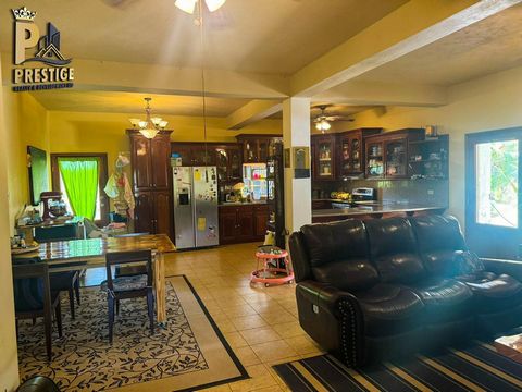 Cozy countryside three-bedroom, two-bathroom home located in Libertad, Corozal, Belize, near the lovely New River. This spacious home is nestled in a large developed property offering an amazing 4.98 acres of land, perfect for your mini farm or a min...