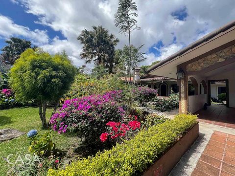 Experience luxury living in the heart of downtown Boquete in Panamonte Estates. This rare opportunity offers a stunning home nestled in a historic gated community.  More Photos coming soon. Upon entering, you're greeted by an expansive living area th...