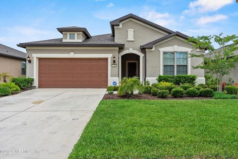 Spectacular, bright & airy open concept home with a water view located in the highly desirable, gated neighborhood of Del Webb Ponte Vedra in Nocatee! It is situated in the NEWEST section of Del Webb close to the 2nd entrance for easy access to the k...