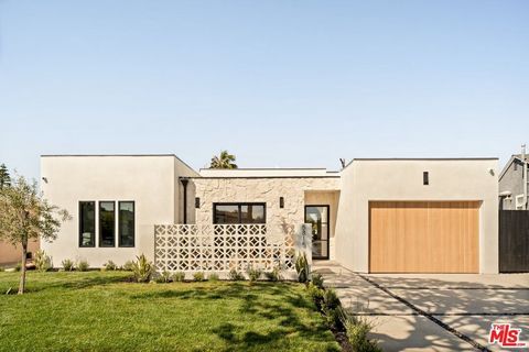 Discover 5815 W 77th Place a thoughtfully designed single-story residence tucked into the tranquil Westport Heights neighborhood of Westchester. This four-bedroom, four-bath home seamlessly blends Scandinavian simplicity with the organic warmth of Ja...