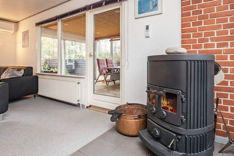 Holiday cottage in 1st row to the beach on an approx. 2700 m² large beach plot just 90 m from the Limfjorden. Bright decor with combined kitchen and living room. There is a wood-burning stove for a cold evening. TV with international channels, stereo...