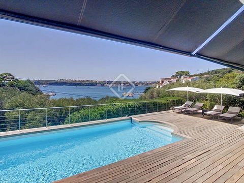 Lucas Fox presents this impeccable modern design villa of 237 m² on a 721 m² plot in Cala Partió, in the municipality of Maó, with access to the pier and mooring. The 1960s property built by a Swedish architect was completely renovated in 2018 and is...