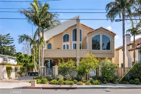 Dramatic contemporary custom home reduced to sell now! Soaring ceilings, French doors and large arched double-pane windows welcome you into this Newport Heights-adjacent home with sunset views and a peek-a-boo ocean view*Designed in the mid-1990's w/...