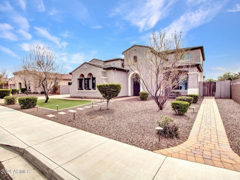 Welcome to luxury living at its finest in the heart of Gilbert! This impeccably maintained home offers an exceptional blend of space, style, and functionality. As you approach, manicured landscape, paver driveway and walkway set the tone and lead you...