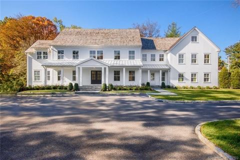 This newly constructed Nantucket-Style Colonial, exudes timeless elegance. The 6 bedroom and 6.2 bathroom home is meticulously designed with high-end finishes and exquisite millwork throughout. An impressive 3-story foyer anchors the expansive main l...