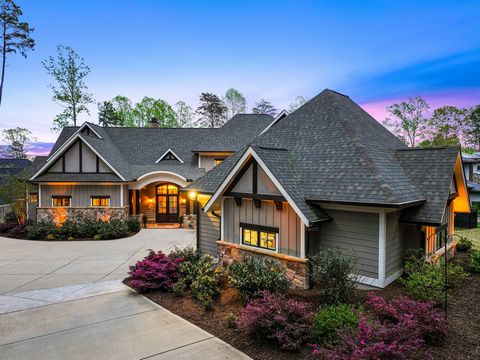 Passing through the gates of Webbs Chapel Cove brings you to a private and secluded Lake Norman waterfront home, tucked away on over 2 undisturbed acres. Commissioned in 2019 the sellers worked with locally sought after architect Kevin Holdenridge of...