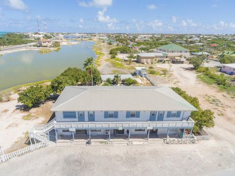 Welcome to Pelican House, a remarkable property located in the heart of Grand Turk. Built in 1996, this expansive listing offers a generous 5000 square feet of space. Nestled on a 0.32-acre lot with 140 feet of road frontage, Pelican House provides e...