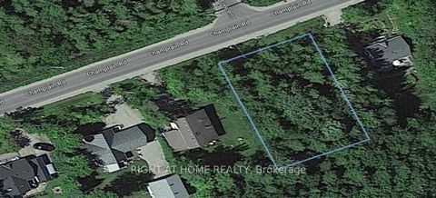 Welcome to your canvas of opportunity in the heart of nature's embrace! Nestled in the serene landscapes of Tiny, Ontario, this parcel of land spans an impressive 100 x 150 feet, offering a prime canvas for your dream retreat or investment venture. S...