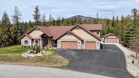 This impressive NW styled home offers 3492 square feet of luxury living space. The great room and family room offer comfortable areas for relaxing or entertaining guests. The main floor features a master suite, perfect for ultimate relaxation and con...
