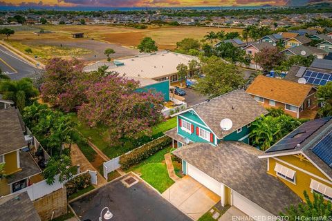 Rare cul de sac corner lot, attached single family home available in highly sought after Holomoana Sea Country! This spacious 3 bedroom and 2 full bathroom home features a large 2 car garage, driveway parking, and plenty of guest spots nearby. Downst...