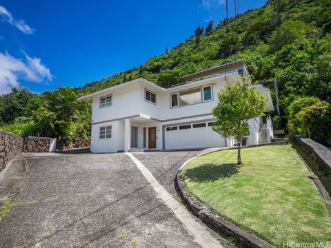 Escape to the lush, tree-lined streets of Manoa, where cool breezes, scenic rainbows, and a strong sense of community create the perfect place to call home. Tucked away on a quiet dead-end street, this charming 4-bed, 3-bath, 2-car garage home offers...