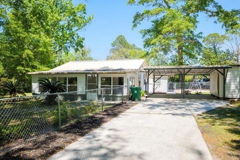 This delightful, remodeled home is nestled on almost half an acre. It boasts 3 bedrooms, 2 bathrooms, and a host of desirable features for comfortable living. Upon entering, you're greeted by an enclosed front porch, perfect for enjoying your morning...