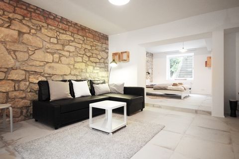 Beautiful basement apartment can be found in the colony of family houses in Zahradní Město in Prague district of Záběhlice. This quiet locality offers plenty of parks, one is right in front of the house, another park with children's playground is a t...