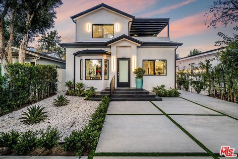 Introducing a completely reimagined home located on a tree-lined street in prime Studio City. Meticulously designed, this 4BD/2.5BA main residence, accompanied by a detached 2BD/1BA Accessory Dwelling Unit (ADU), exudes unparalleled craftsmanship at ...