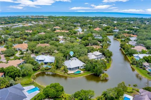 Discover lakefront living at its finest in this exquisite residence situated on .53 Acres. Stylish living space with detailed millwork & beautiful craftmanship throughout. Living rm seamlessly flows to a fabulous screened lanai offering ample space f...