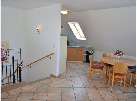 Holiday apartment with 2 bedrooms, up to 4 people, washing machine, WiFi, approx. 400m to the Baltic Sea sandy beach, balcony with view of the greenery, family friendly