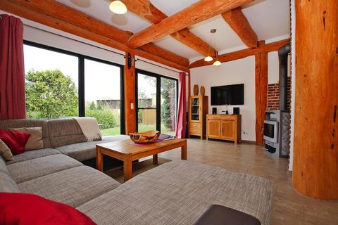 The natural log half-timbered house is located right on the edge of the forest in a quiet location, just 350 meters from the beach on Fleesensee in the Untergöhren district. The loving and comfortable furnishings immediately make you feel relaxed and...