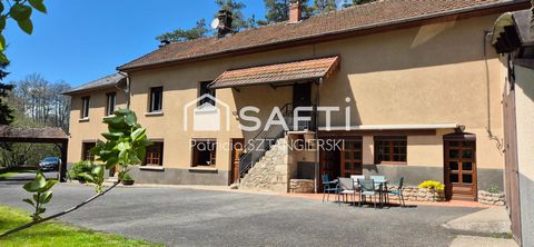 Belle maison familiale rénovée T7 avec grande surface de garages et parcelles jardin et bois.