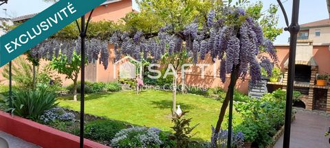 Maison de plain pied avec jardin et garage