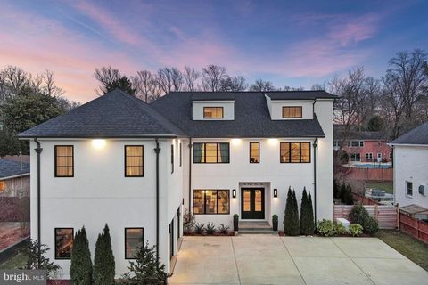 This exquisite 8,313 sq ft custom home in the prestigious Kenwood Park neighborhood of Bethesda is a masterpiece of design and craftsmanship. Situated on a beautifully landscaped 0.29-acre flat lot within the highly sought-after Walt Whitman High Sch...
