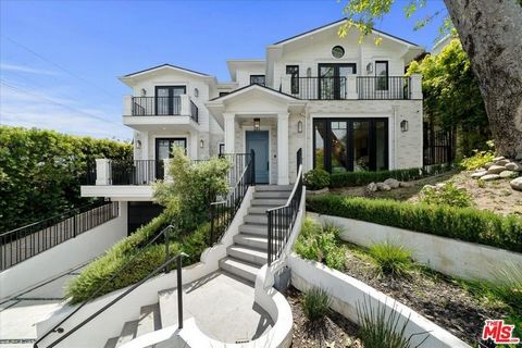 A stunning custom-built residence located in the desirable Cheviot Hills area, this exceptional home offers a fabulous blend of luxury, functionality, and design. Boasting 6 bedrooms and 7.5 bathrooms, including a fully equipped standalone ADU with i...