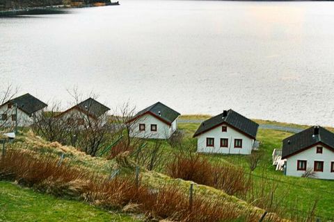 A renovated cottage (2015) with a beautiful view of the fjord from the 10 m² large terrace. Excellent fishing conditions all year round. There are 5 cottages, 2 big and 3 smaller ones. This unit is number two from the left as seen from the sea. There...