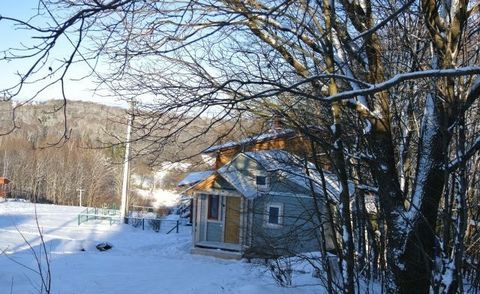 Daily rent house 50 m (beam) 8. Ski Free-Stepanovo, 30 metres from the ski lift. House of wood, warm. The House cold hallway for ski and snowboard storage, warm Hall, common room-living room with kitchen and sofa, bedroom, loft with beds, shower, toi...