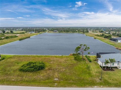 Waterfront. Discover the perfect canvas for your Florida dream home on this stunning homesite located in a deed-restricted community. Nestled alongside a picturesque pond, this property offers a serene setting while being just a stone's throw away fr...