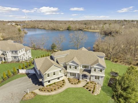 Escape to unparalleled luxury with this custom-built home overlooking Sanctuary Cove Pond and Weir River. Crafted w/meticulous attention to detail, no expense was spared in this dream home.The first floor features a gourmet kitchen with 10 ft marble ...