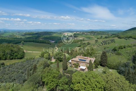 This wonderful property is located in the municipality of Montalcino, near the delightful village of Montisi, in the charming landscape of the Crete Senesi. It consists of a beautiful stone villa of 440 sqm on two levels as follows. On the ground flo...