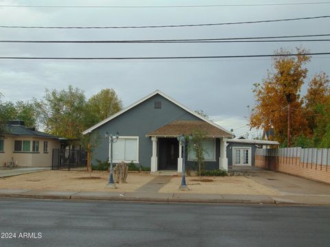 Great Investment Opportunity! Two homes for the price of 1 on a huge lot in the center of Mesa's redevelopment zone. Could be for a multigeneration family or an income producer! Zoned Commercial, multi family or could be developed. Primary home has b...