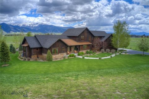 This stunning custom-built home boasts 4 bedrooms, 3 baths, and sits on 1.6 acres with nearly 107 acres of open space behind. Walls of windows in the great room showcase breathtaking, unobstructed views of the iconic Bridger Mountains. With a beautif...