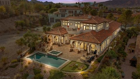 Welcome to the prestigious and exclusive Guard-Gated South Shore community. Here, resort-style living is at its finest, showcasing opulence through timeless architectural design. This lavish 5 BR retreat spans across 6,430 sq ft with views overlookin...