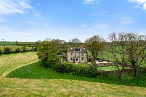 Set in a half-acre, hillside position affording unparalleled, commanding views of The Pennine’s stretching from Yorkshire, through Greater Manchester and on to the neighbouring county of Cheshire, this wonderful former Vicarage includes a further det...
