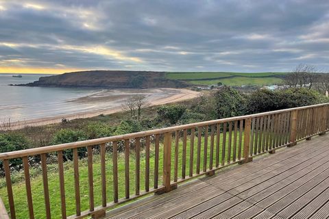 This charming three-bedroom beach bungalow offers an inviting open-plan living area that beautifully merges the kitchen, dining, and sitting spaces, complete with a cozy multi-fuel woodburner for those cooler evenings. The fully equipped kitchen come...